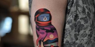 Space tattoo Cat tattoo in a spacesuit what does it mean